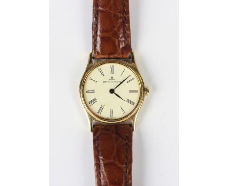 A Jaeger-LeCoultre 18ct gold circular cased lady's wristwatch, the signed dial with black Roman numerals, detailed 'Swiss Q M