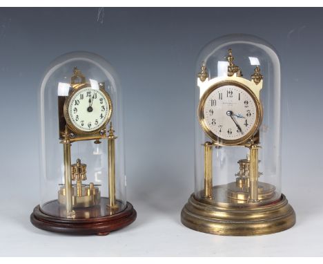 An early 20th century German gilt brass anniversary timepiece by Gustav Becker, the silvered circular dial with Arabic hour n