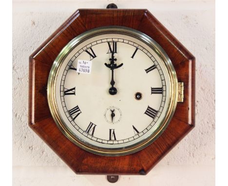 A Victorian walnut octagonal cased wall timepiece, width 21.5cm, together with a Victorian oak wheel barometer with carved de