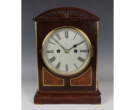 An early 20th century stained beech mantel clock with eight day twin fusee movement chiming and striking on five gongs with p