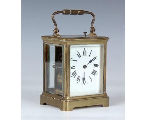 A 19th century/early 20th century French brass cased carriage clock with eight day movement striking hours and half hours and