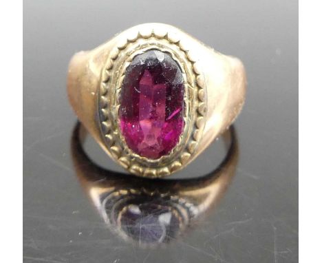 A circa 1900 yellow metal and garnet(?) set signet ring, unmarked but tests as approx 9ct gold, 5.8g, size I/J