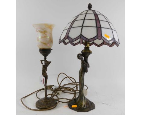 A bronzed metal figural table lamp, having a coloured glass shade, height 42cm, together with another similar (2)