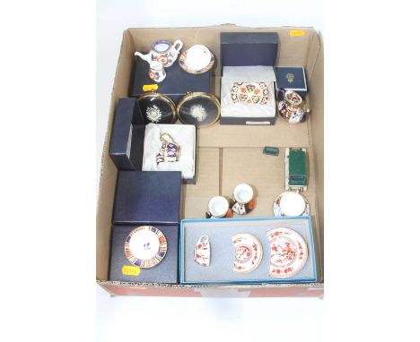 A collection of miniature ceramics, to include a Royal Crown Derby imari coffee service, and a Coalport Indian Tree pattern p