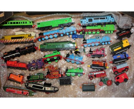 A tray containing children's trains to include Thomas the Tank Engine etc