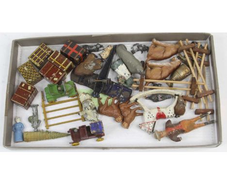 A collection of vintage models, to include lead painted figures and tinplate model luggage 
