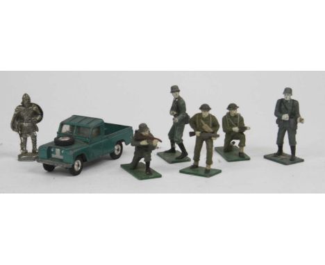 A vintage Corgi model diecast Landrover together with a collection of lead painted army figures