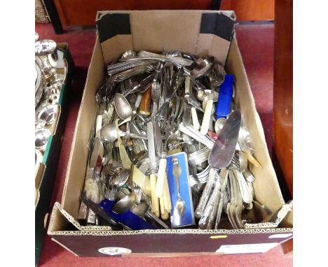 A collection of silver plated flat ware to include table forks, table knives, serving spoons, ladle etc