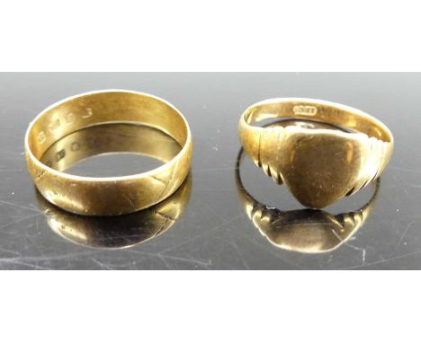 An 18ct gold wedding band, size O; together with an 18ct gold signet ring, size N, gross weight 5.4g (2)