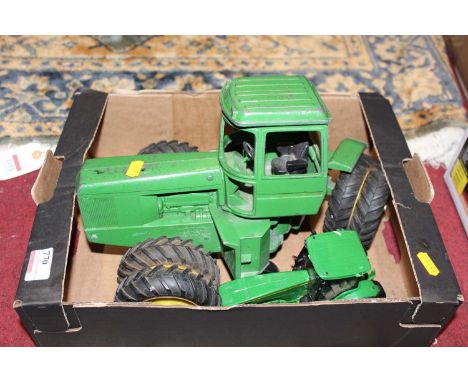 An ERTL 1/16 scale articulated 4WD John Deere tractor, together with one other