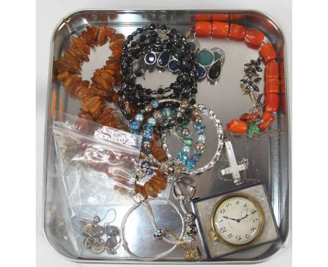 A collection of costume jewellery to include beaded necklaces and bracelets, and a Zenith pocket watch