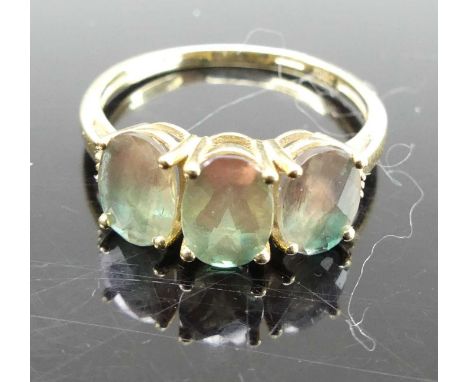 A 9ct gold and green tourmaline set half hoop ring, 2g, size N