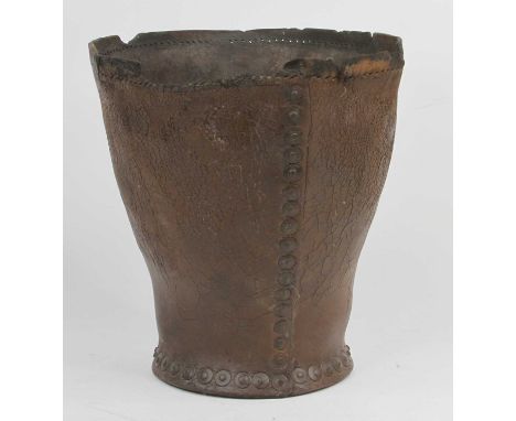 A vintage leather waste paper basket, height 27cm