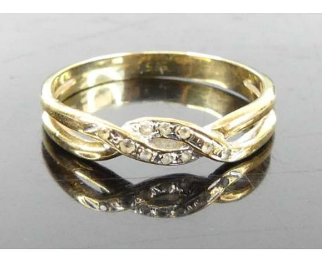 A yellow metal and cz set band ring, stamped 585 and tests as approx 14ct gold, 2.1g, size P/O