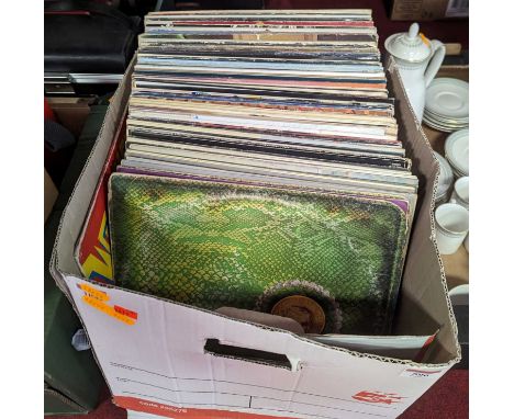 A collection of vintage LPs, to include Alice Cooper and The Bluebells 