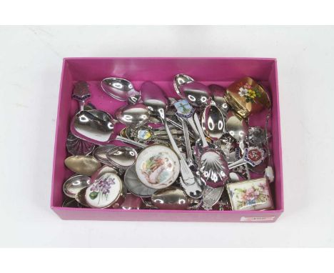 A collection of vintage souvenir spoons and trinket boxes 