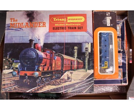 Two trays containing 00 gauge related trains and accessories to include Triang Hornby, The Midlander electric train set, Lima