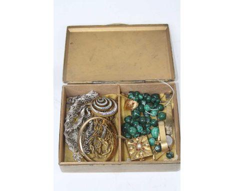 A collection of costume jewellery to include a string of malachite beads, a lady's Seiko quartz wristwatch, and an enamel dec