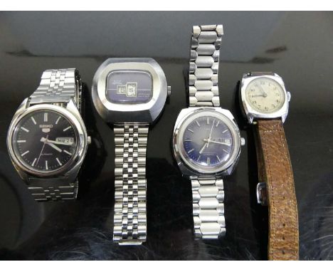A gent's Seiko 5 steel cased automatic wristwatch, having crystal back cover; together with a gent's Timex steel cased automa