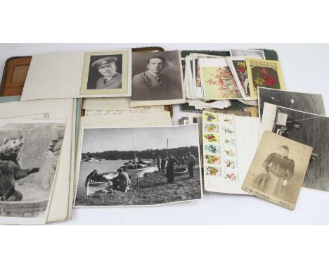 A collection of vintage stamps and postcards, and photographs
