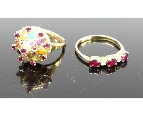 An 18ct gold, ruby and cz set half hoop ring, size M/N; together with a 14ct gold multi-stone set cluster ring, size M, gross