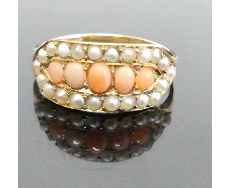 An 18ct gold, coral and seed pearl set dress ring, circa 1900, 2.6g, size M/N