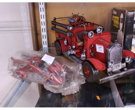 A Popular Imports model of a Fire Department engine together with one other example