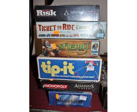A quantity of various board games to include Assassins Creed Risk, Ticket to Ride Euro, etc