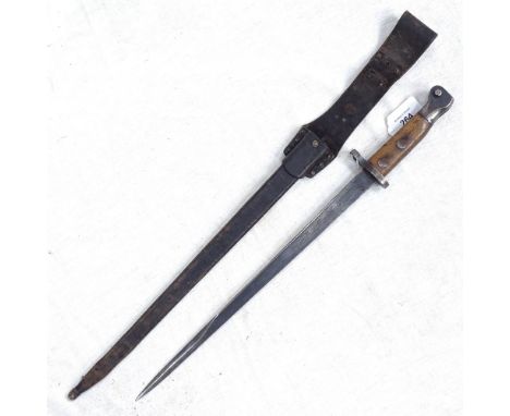 A Hembrug bayonet in scabbard, length 47cm 