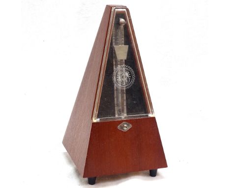 A German metronome, boxed, and a music stand 