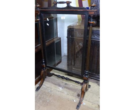 A Victorian ebonised and walnut firescreen, with inset glass panel, on sabre leg, W61cm 