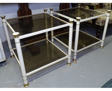 A pair of cream and gilt-metal 2-tier lamp tables, with smoked glass shelves, W54cm, H51cm 