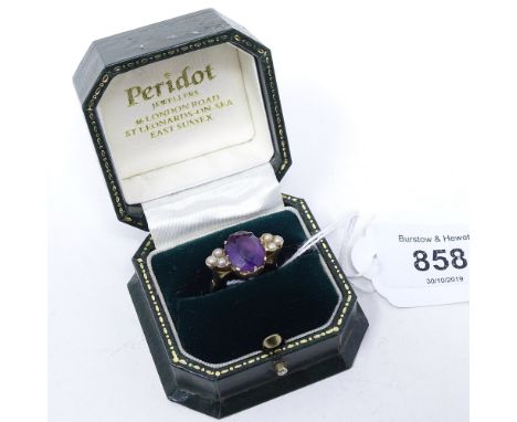 An unmarked gold amethyst and seed pearl dress ring 