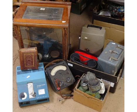 Balance scale in display case, a musical photograph album, various instruments 