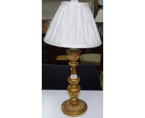 An acanthus leaf carved giltwood table lamp and shade 