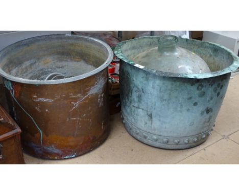A verdigris copper pot, 50cm diameter, another, a lamp and a carboy 
