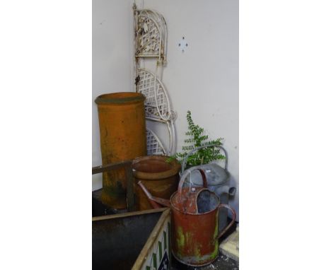 2 terracotta chimney pots, 2 galvanised watering cans, and a folding shelf 