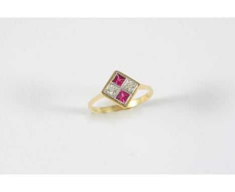 A RUBY AND DIAMOND RING the two square-shaped rubies are set with two circular-cut diamonds, in 18ct. gold. Size O.