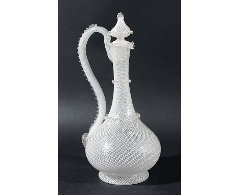 VENETIAN STYLE LATTICINO GLASS EWER AND STOPPER, of globe and shaft form, the body with fine white enamel decoration and clea