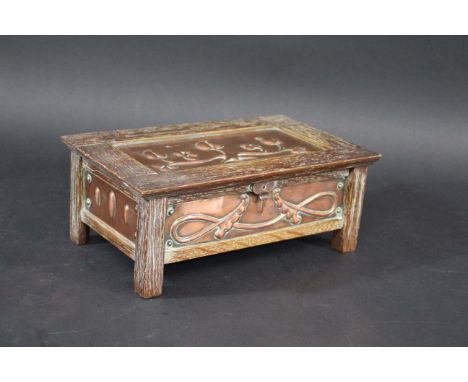 ARTS &amp; CRAFTS PLAYING CARD BOX a limed oak box, with copper panels on the top and on each side. With a fold down flap and