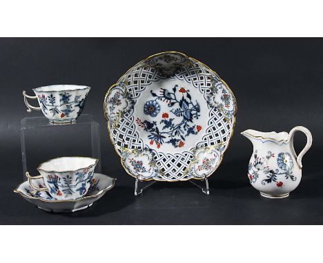 MEISSEN TEA SET, circa 1900, of shaped form, underglaze blue, iron red and gilt decorated with a floral design, comprising ei