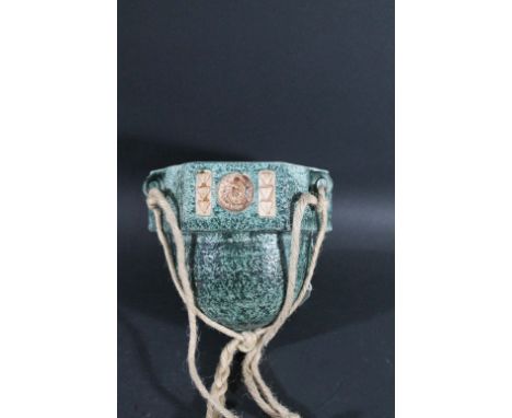TROIKA HANGING PLANTER a hexagonal shaped planter with a repeating design around the rim, the bottom section of dome shape an