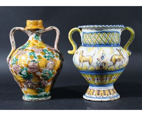 SPANISH FAIENCE VASE, mid 19th century, of two handled form decorated in typical maiolica colours with scenes of bull fightin