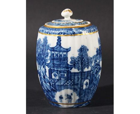 CAUGHLEY TEA CANISTER, circa 1780, of reeded barrel form, blue printed in the Temple pattern, the cover with flower bid finia