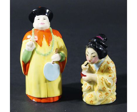 JAPANESE GIRL AND MANDARIN, two Royal Worcester candle extinguishers, date code for girl 1925, puce and black factory marks, 