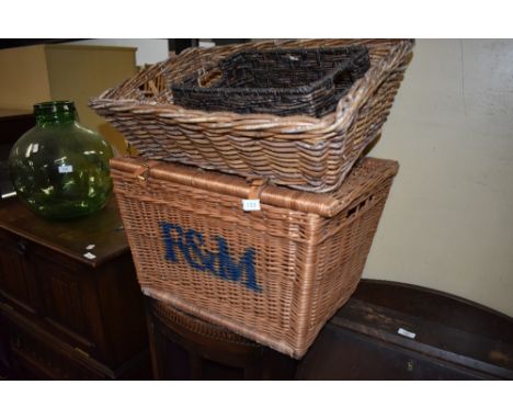 A selection of wicker baskets including Fortnum and Mason picnic hamper