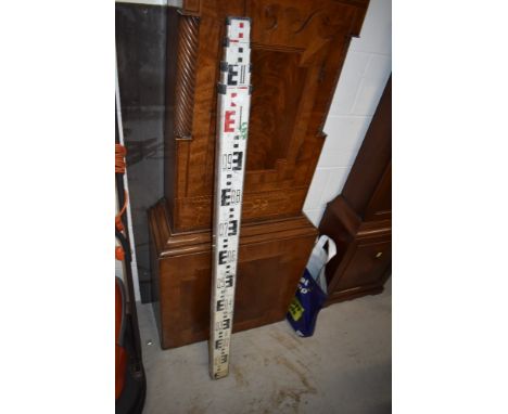 A surveyors or land managers level ruler
