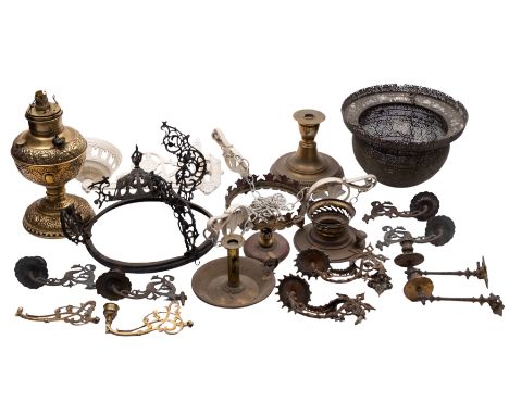 A quantity of assorted brass domestic lighting, mostly 19th century; including an urn form table lamp; another in a form of a