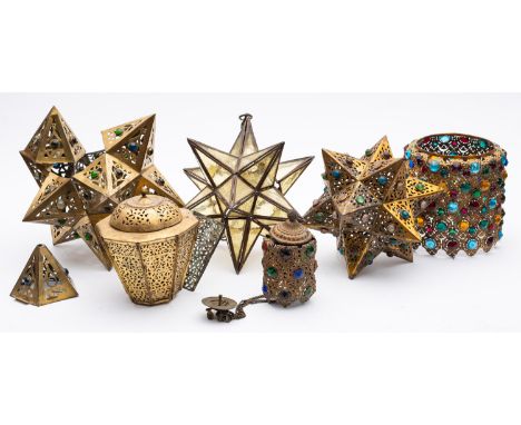 Two late Victorian/Edwardian brass star shadow lamps with applied coloured stones, 34cm and 31cm across, a leaded glass star 