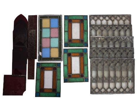 A collection of various leaded glass panels and six ruby tinted glass 'Gothic' pointed arch panel insets, 27.5cm x 11cm 